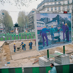 Billboard on a construction site in the center of Paris